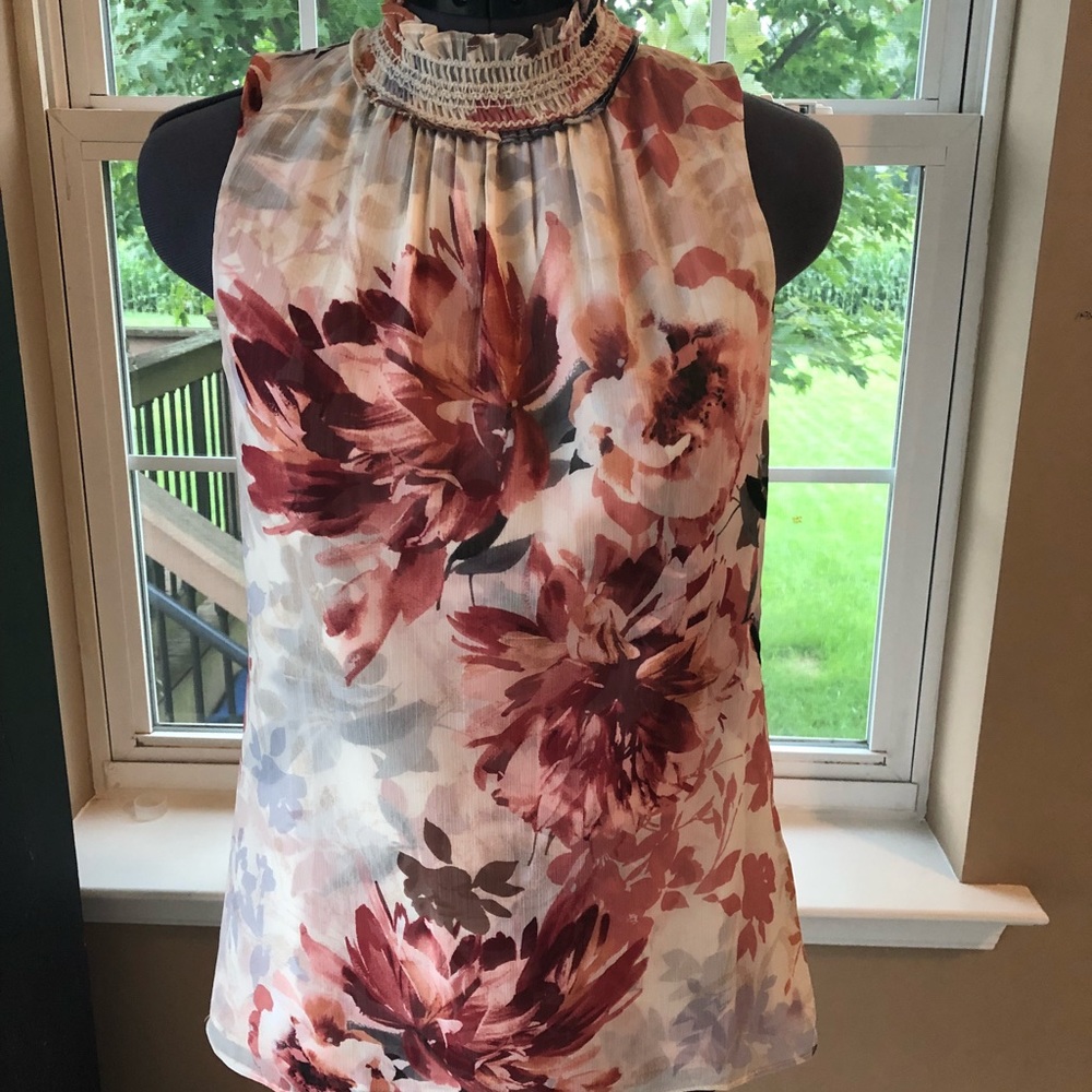 Sleeveless mock neck top